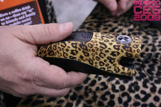 Illustration for article titled Taser Gun + MP3 Player + Leopard Skin = One Insane Gadget